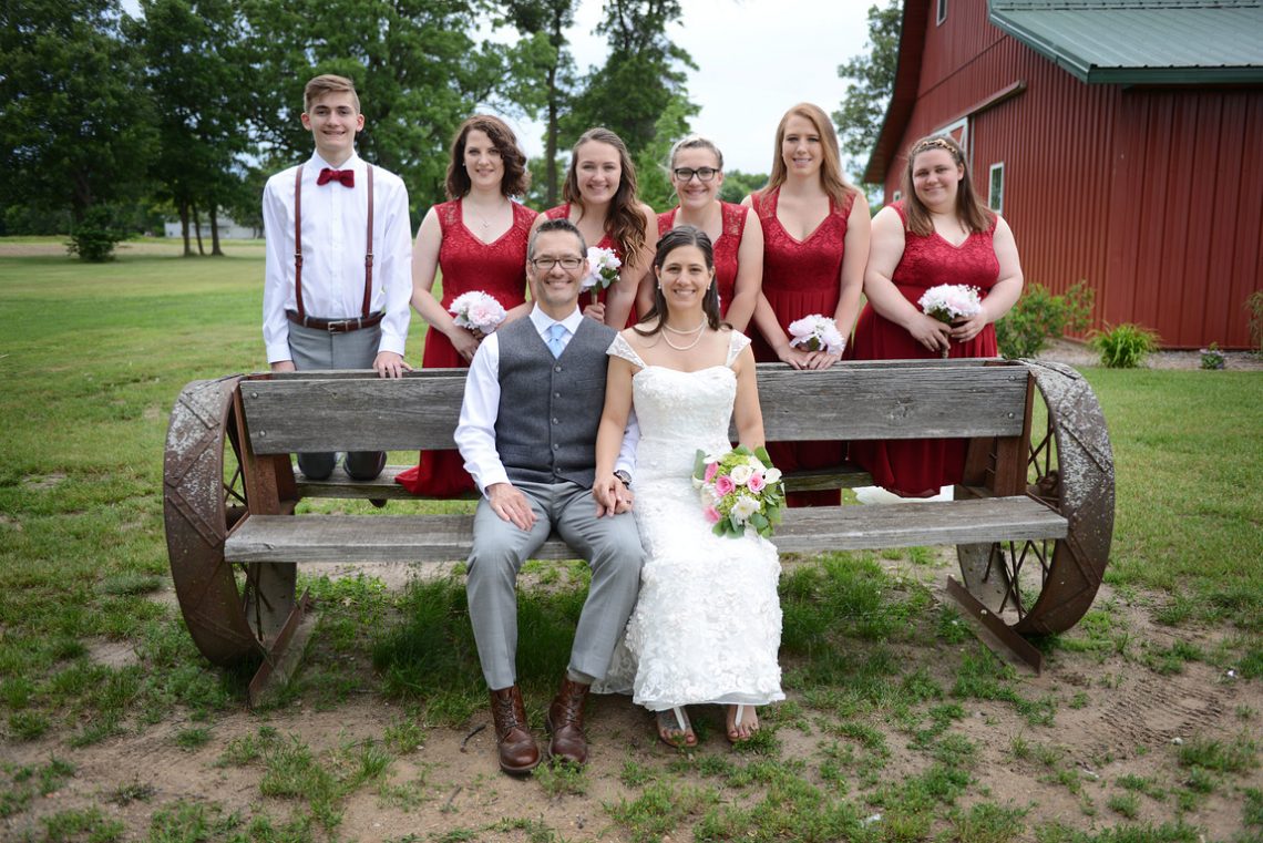 Weddings S&T wedding party on bench