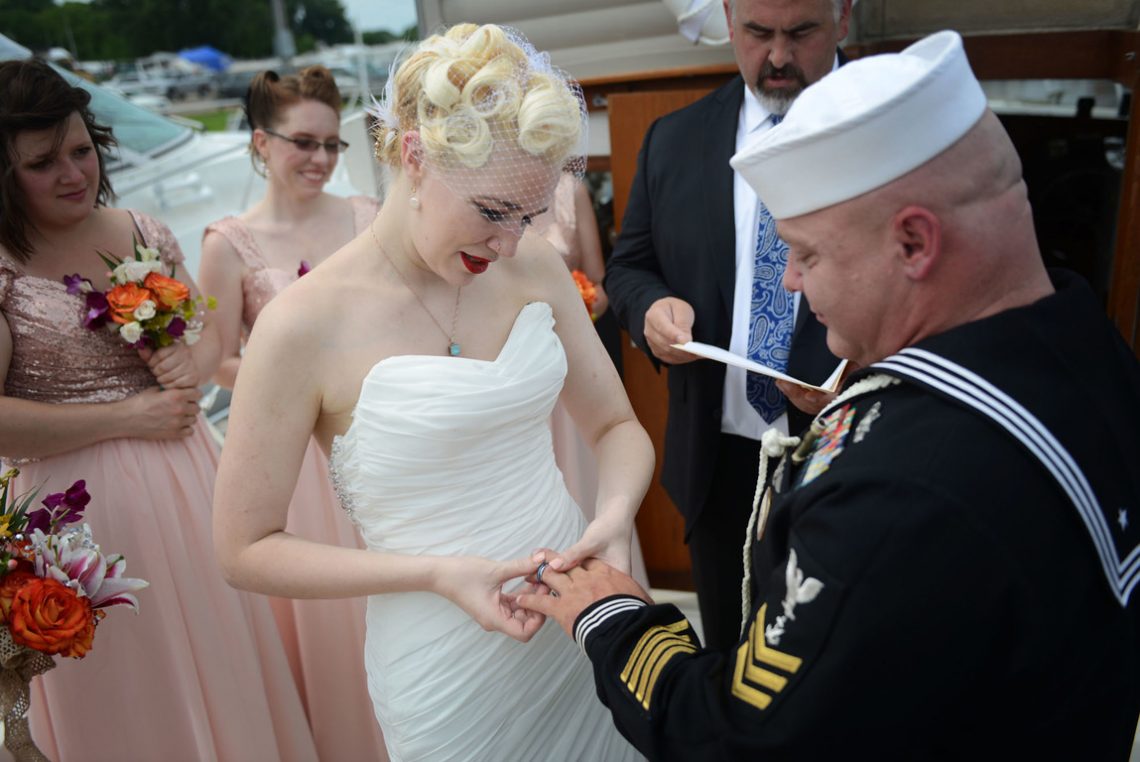 Wedding groom receiving ring
